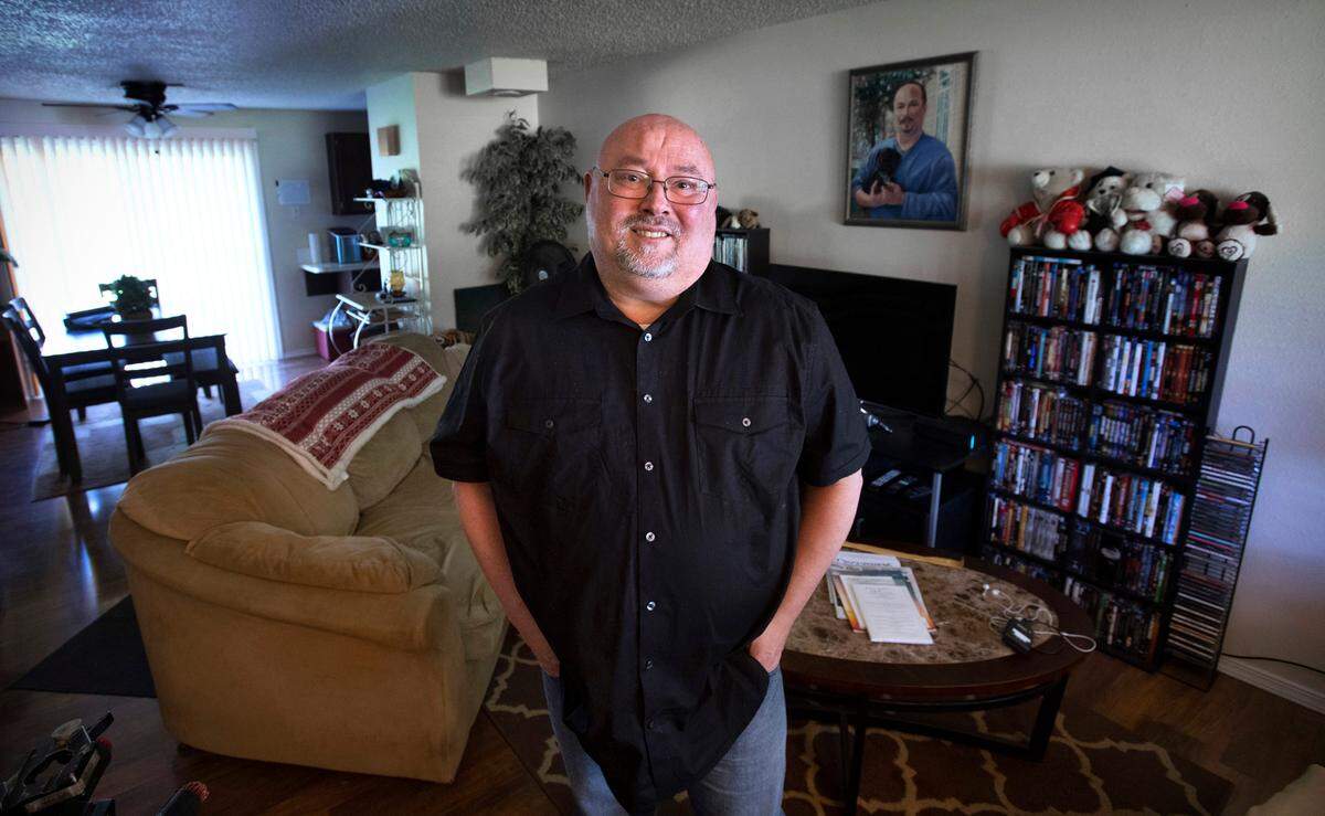 Bill Dankiw has been waiting four months for the rental assistance he applied for in January because of a switch in the non-profit agency administering the program. Meanwhile, his monthly rent continues to come due, which he says is late for this month. Dankiw is shown at his Biscay Acres apartment on Saturday.