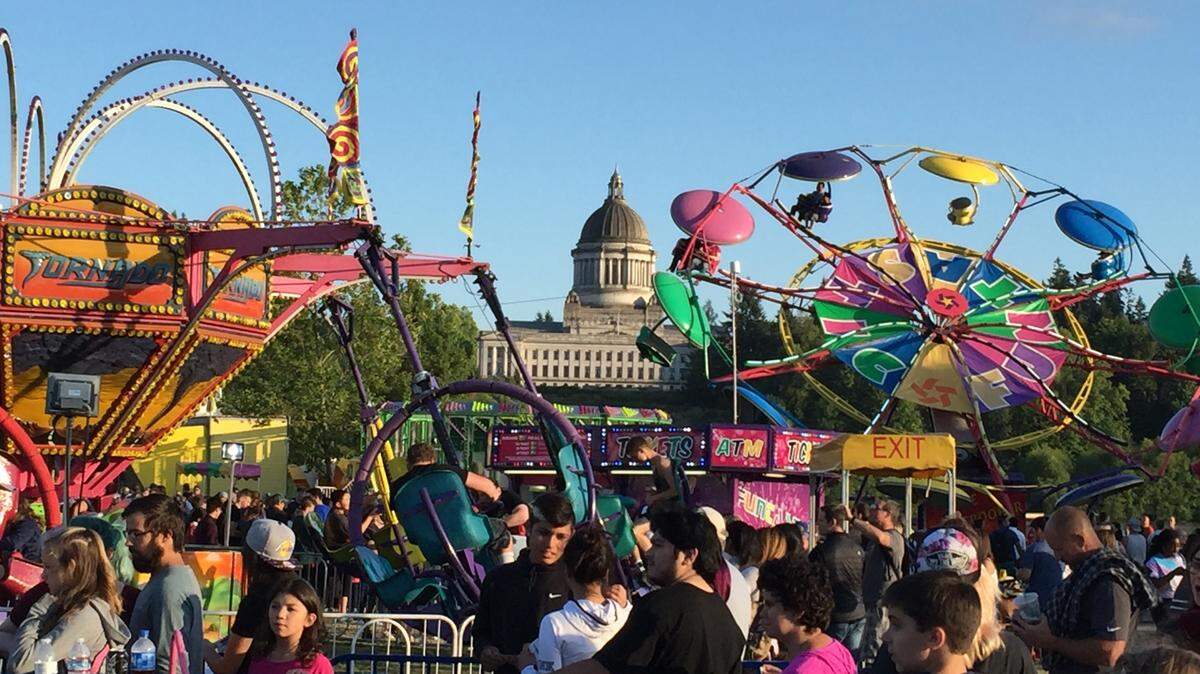 The state Capitol Dome provides a beautiful backdrop for the carnival at Capital Lakefair, which return after a two-year pandemic hiatus.