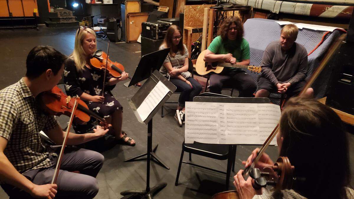 Symphony members recording with youth from The Bridge Music Project. From left, Damian Nelson, Annie Daulton, Emily Lang, Josh Holman, Elliot Loudenback, and Holly Reeves.