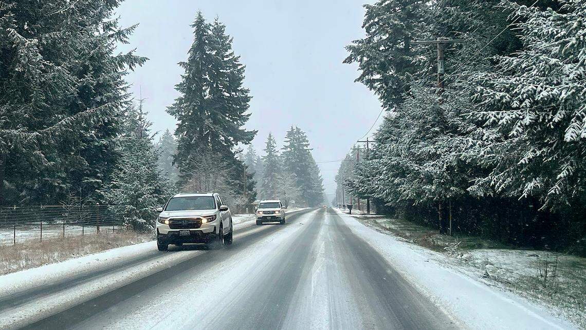 Motorists traveling along 133rd Ave. SE near Rainier, W,. were treated to a dose of winter wonderland as pockets of snowfall blanketed the south sound on Feb. 13, 2025. 