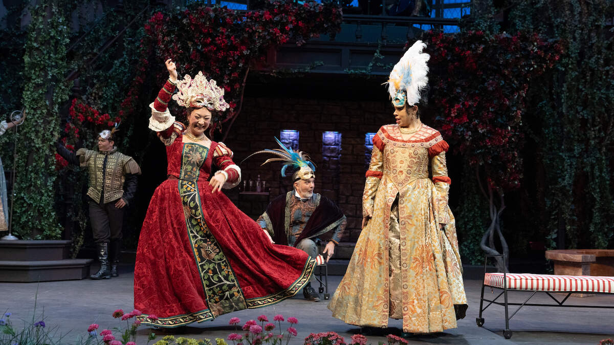 Oregon Shakespeare Festival’s production of “Much Ado About Nothing,” with Amy Kim Waschke, left, as Beatrice and Ava Mingo, is a musical with plenty of physical comedy.