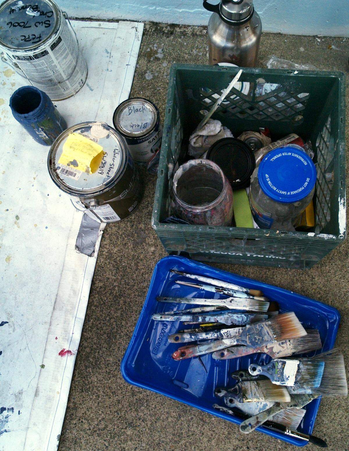 Painstakingly finishing every detail big and small, local artist Austin Davis has worked restoring the landmark “Great Wave” mural that has adorned the west-side wall of the Childhood’s End Gallery in downtown Olympia since 1977. The mural’s creator, well-known regional artist Joe Tougas, has been observing the project and even added his expertise by handling some of the fine handwork detailing.