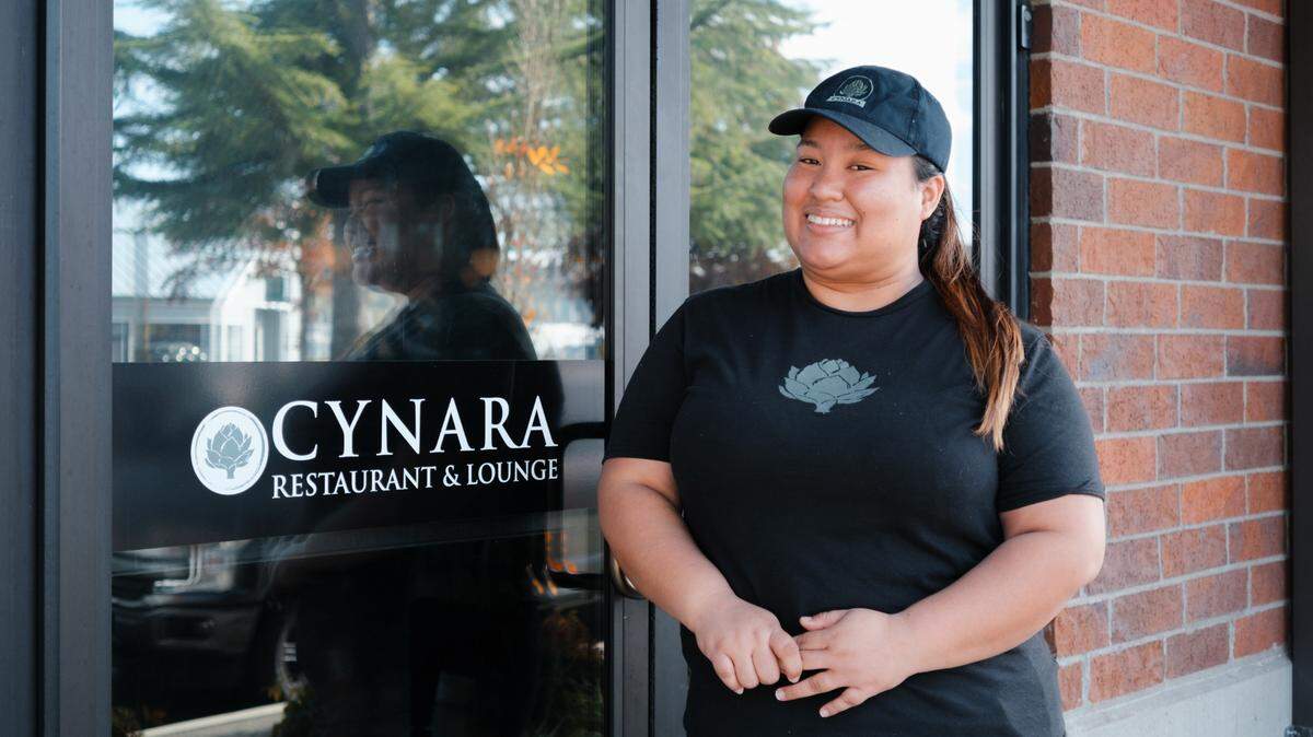 Daviana Ramos Yanez, 25, works as a cook at Cynara Restaurant and Lounge on Columbia Street Northwest. She started a new life in Olympia with the help of World Relief Western Washington, a Christian non-profit that helps refugees and asylees resettle.