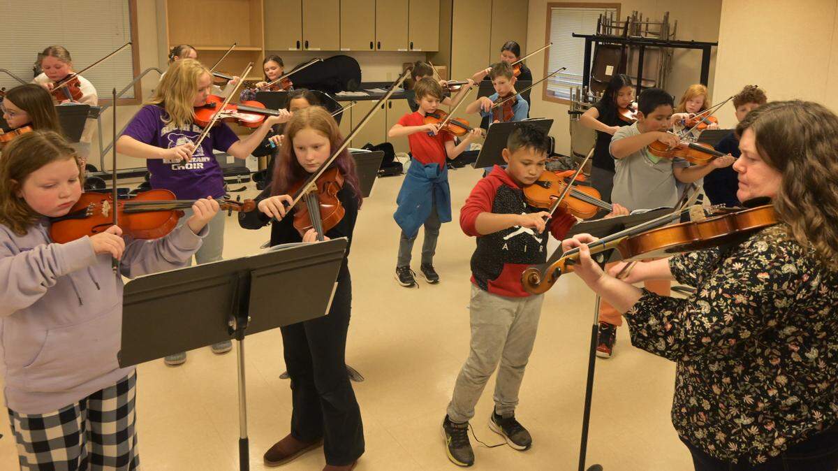 North Thurston Public Schools’ music teacher Rebecca Gage leads her 5th grade strings class at South Bay Elementary. Arts programs are supported by the educational programs and operations levy.
