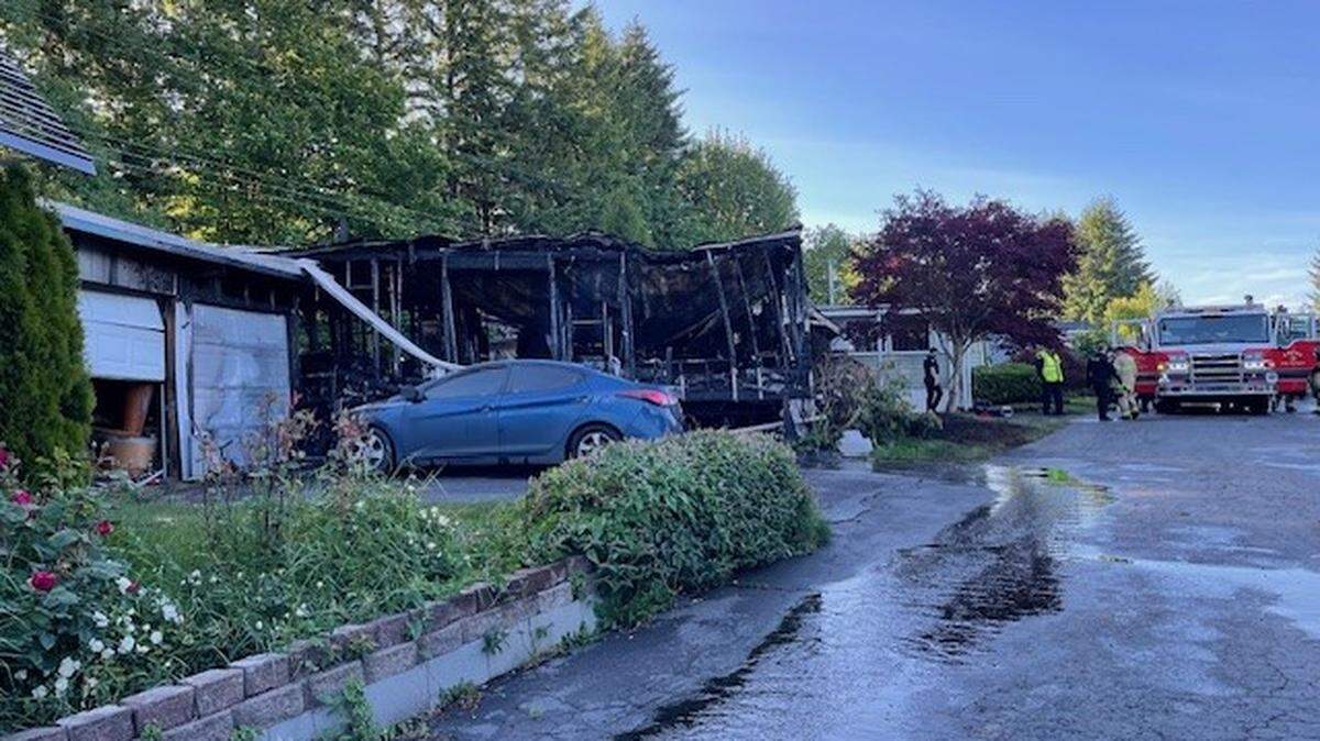 A mobile home was destroyed by an overnight Tuesday fire, killing two youth inside.