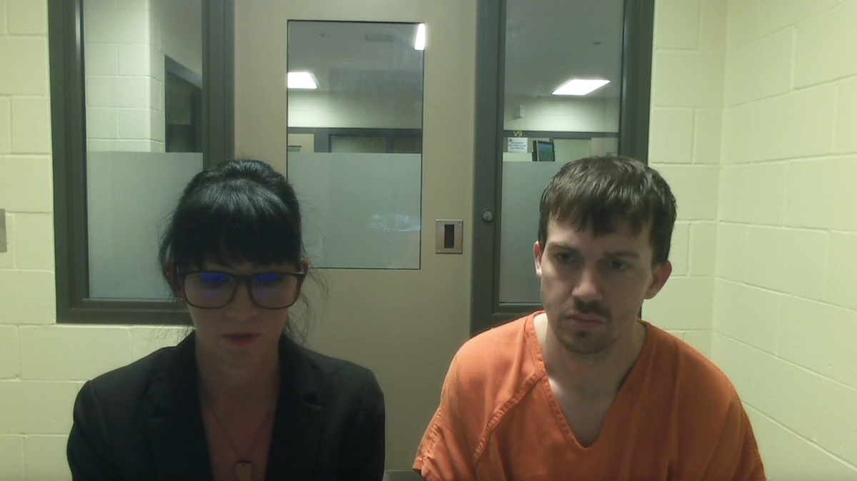 Taylor Ryan Perkins, 31, virtually attends his preliminary hearing in Thurston County Superior Court from the county jail alongside public defense attorney Brit Kreimeyer on Thursday, Nov. 2, 2023. Deputies arrested him Wednesday on suspicion of second-degree murder, domestic violence.