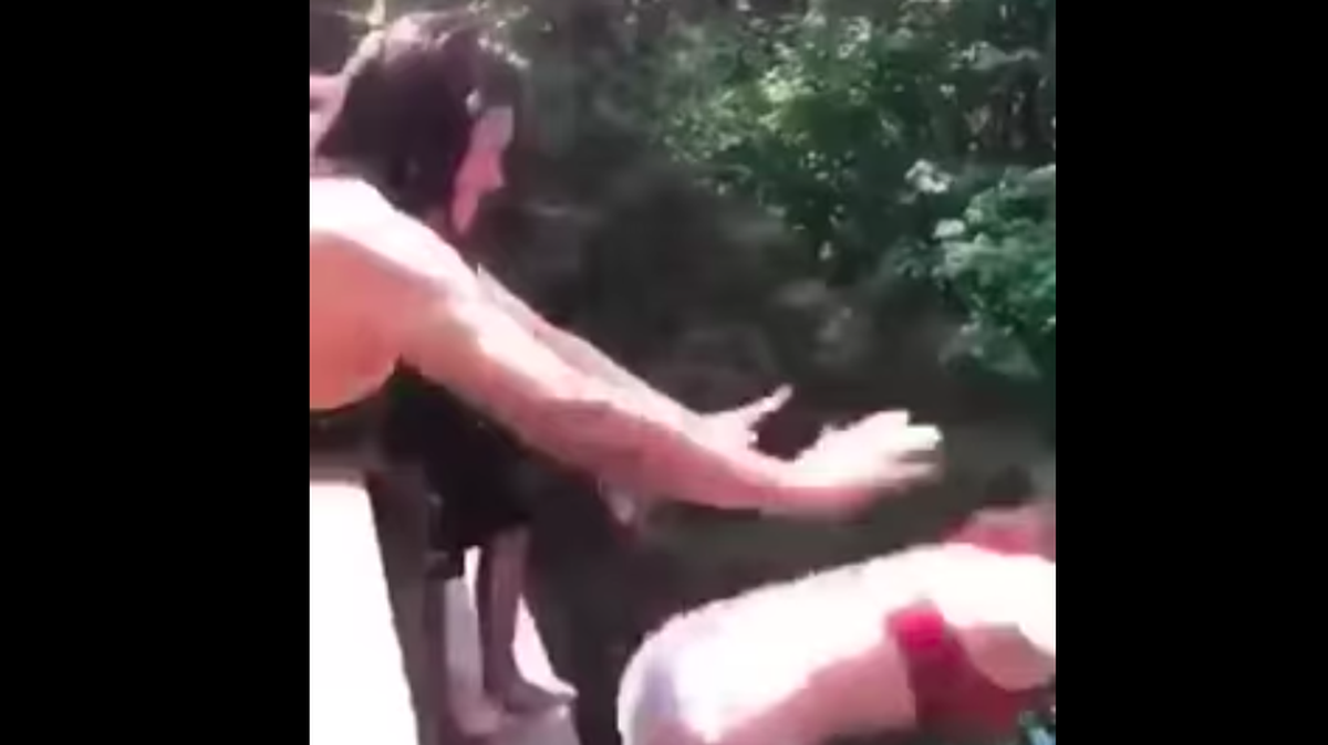 Tay’Lor Smith, pictured left, is shown pushing Jordon Holgerson from the Moulton Falls. Holgerson fell 60 feet to the water face first and survived with broken ribs and punctured lungs; Smith appeared in a  Clark County District Court on Friday, Sept. 7 to face reckless endangerment charges.