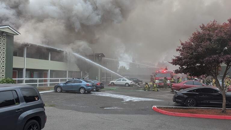 40 firefighters fight two-alarm blaze at Tumwater apartments. One person rescued