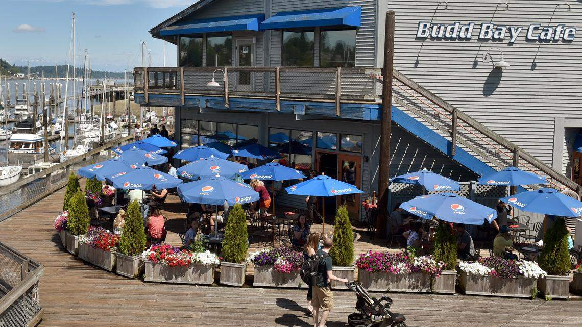 Patrons pack Budd Bay Cafe along Percival Landing in 2017. As soon as Thurston County is able to move to Phase 2 of reopening the economy during the coronavirus pandemic, the cafe will begin to offer seated dining with appropriate social distancing, including outside on its deck.