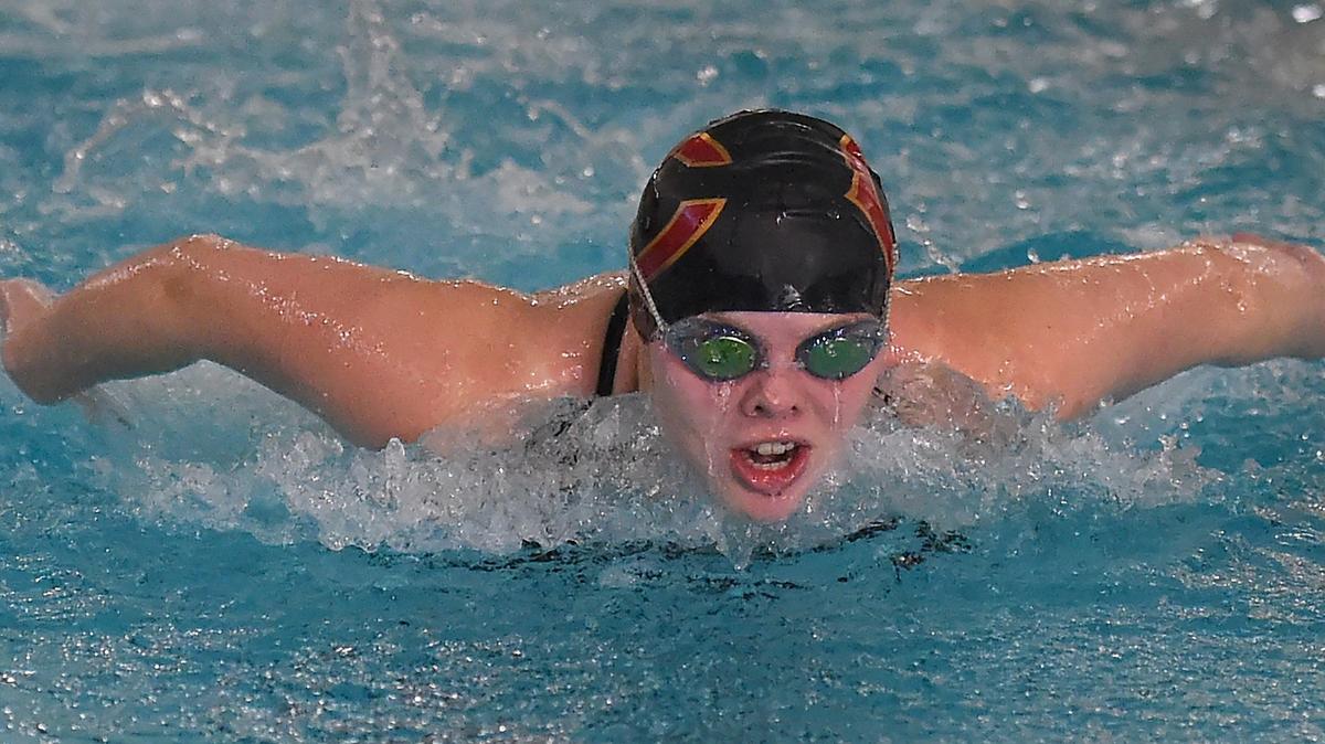 Capital High School junior Camden Martin prepares for the Class 3A state swimming and diving championships at practice on Wednesday, Nov. 7, 2018 at The Evergreen State College in Olympia.