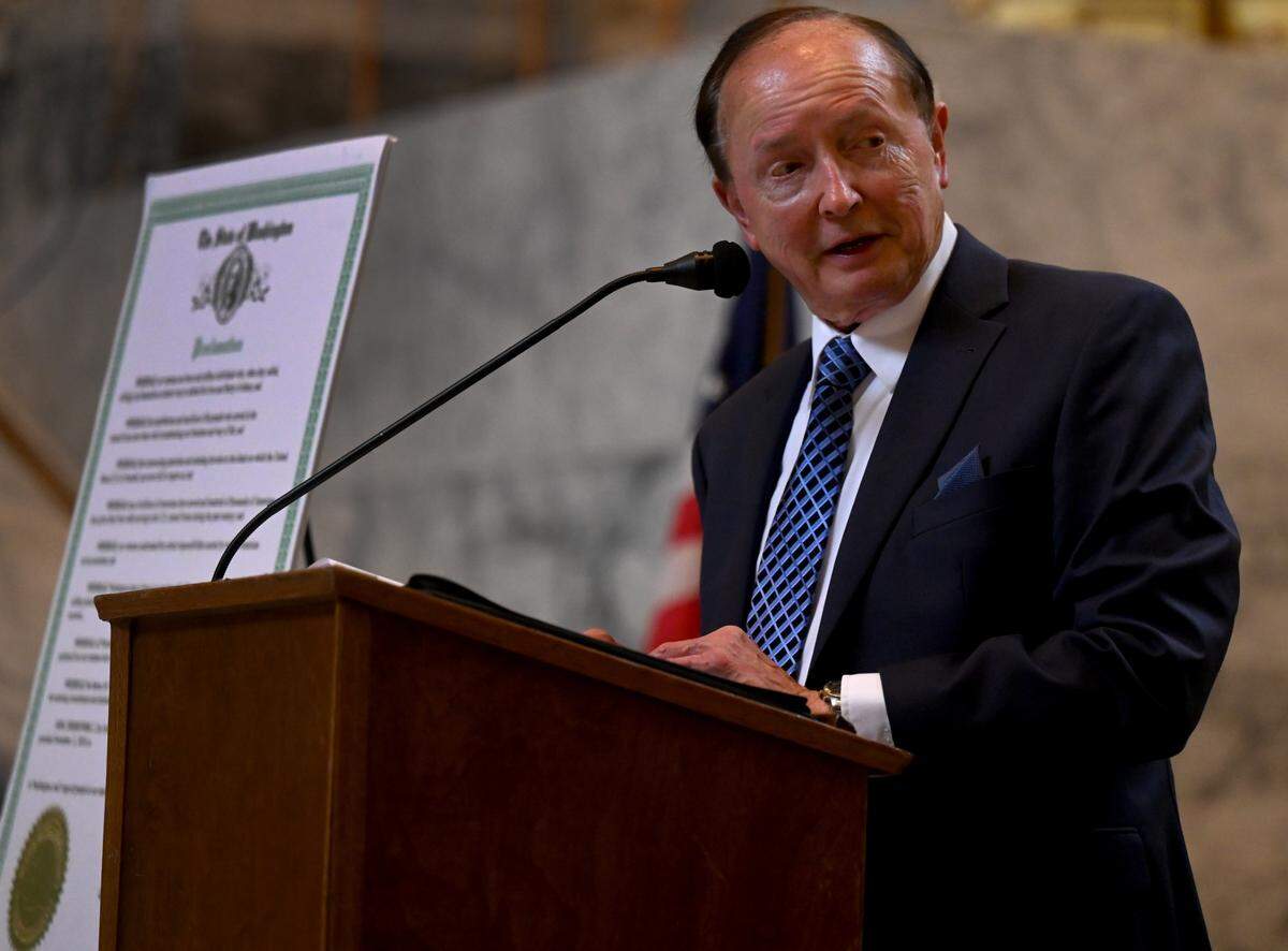 Longtime Olympia broadcaster Dick Pust was the Master of Ceremonies for the annual Veterans Day Ceremony at the Capitol Rotunda in Olympia Monday morning. He was joined at the podium by fellow Army veteran and current Olympia Mayor Dante Payne.