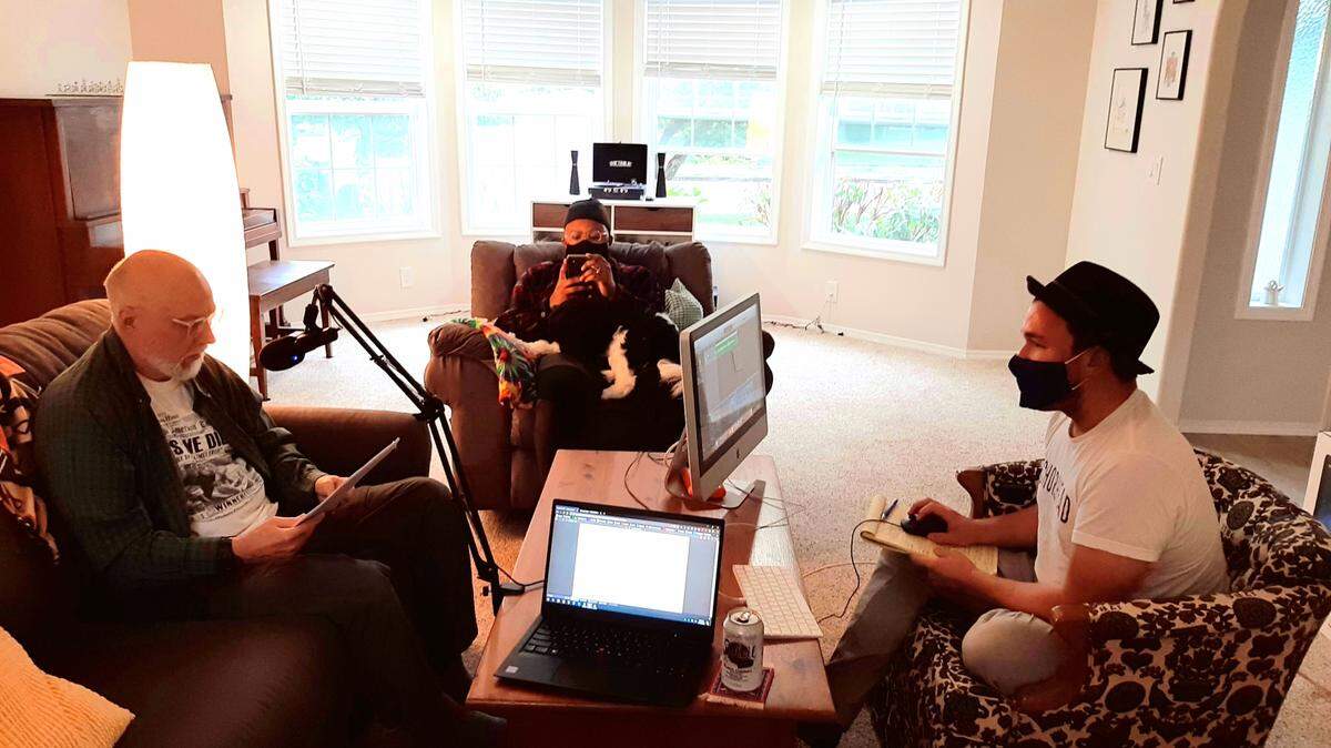 From left, Ed Thorpe, Jalen Penn and Kevin McManus rehearse a one-hour radio show adaptation of Christopher Marlowe’s “Dr. Faustus.”