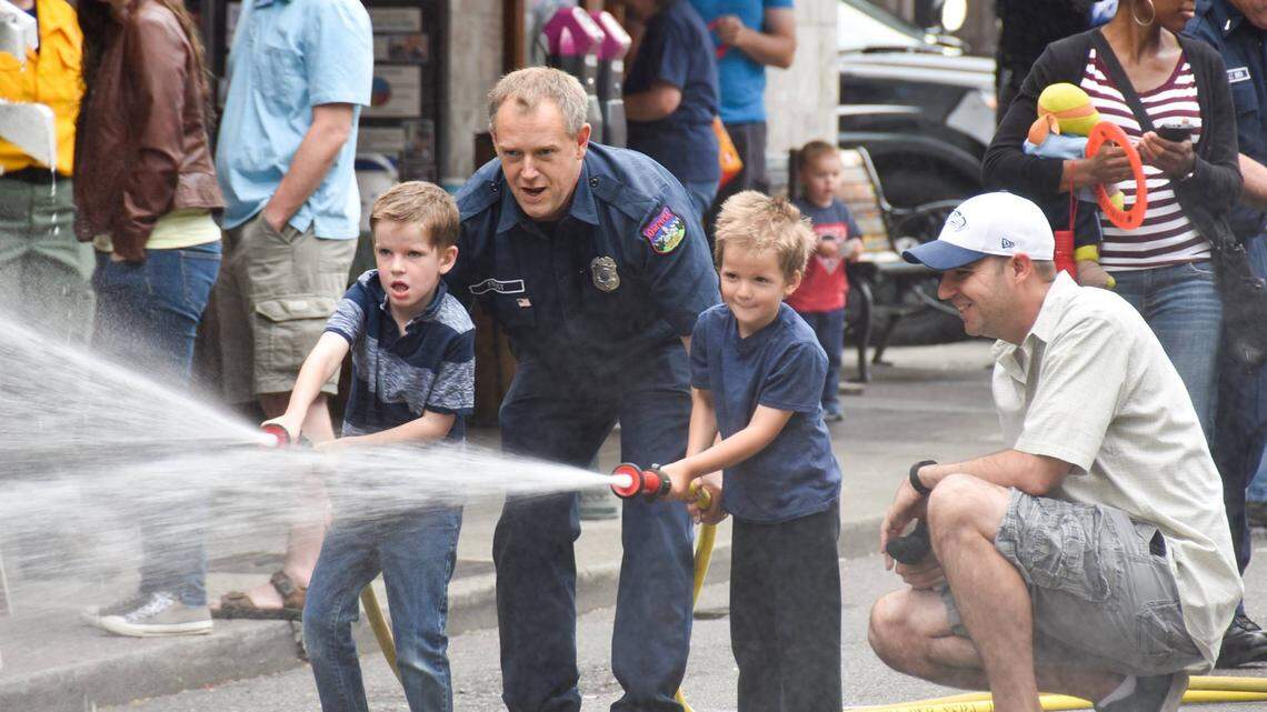Kids can ride the fire truck and go through a firefighter obstacle course during the Summer Splash festival.