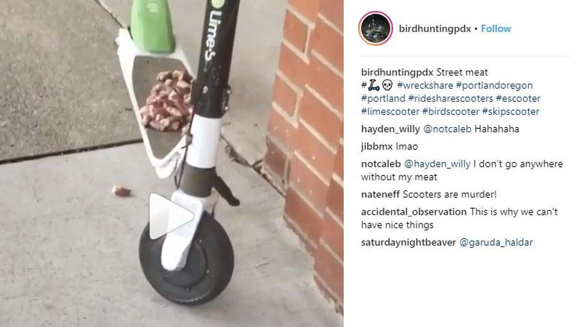 This screenshot from a video on the “birdhuntingpdx” Instagram account shows raw meat being left on a Lime-brand e-scooter in Portland.
