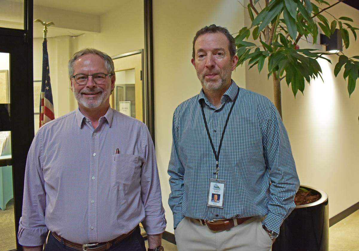 Thurston County Treasurer Jeff Gadman (left) and Thurston County Investment and Banking Officer Rodney Reynolds.