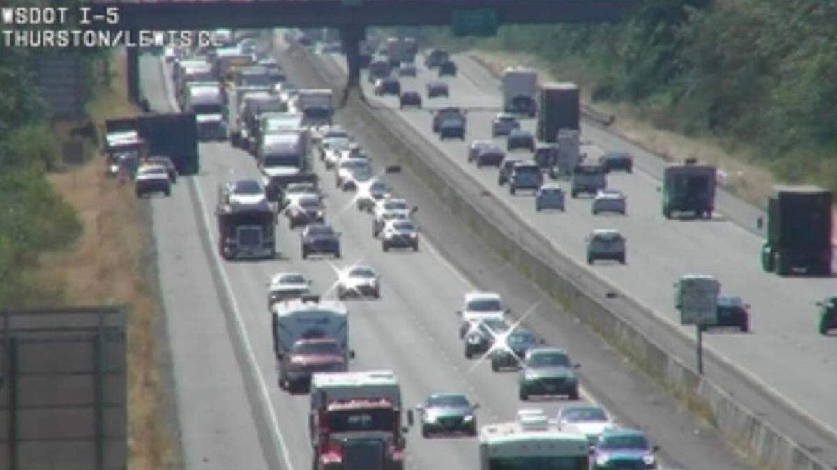 The right lane of northbound I-5 was closed starting at 11:39 a.m. Monday just north of Centralia after a collision between a car and a semi-truck. 