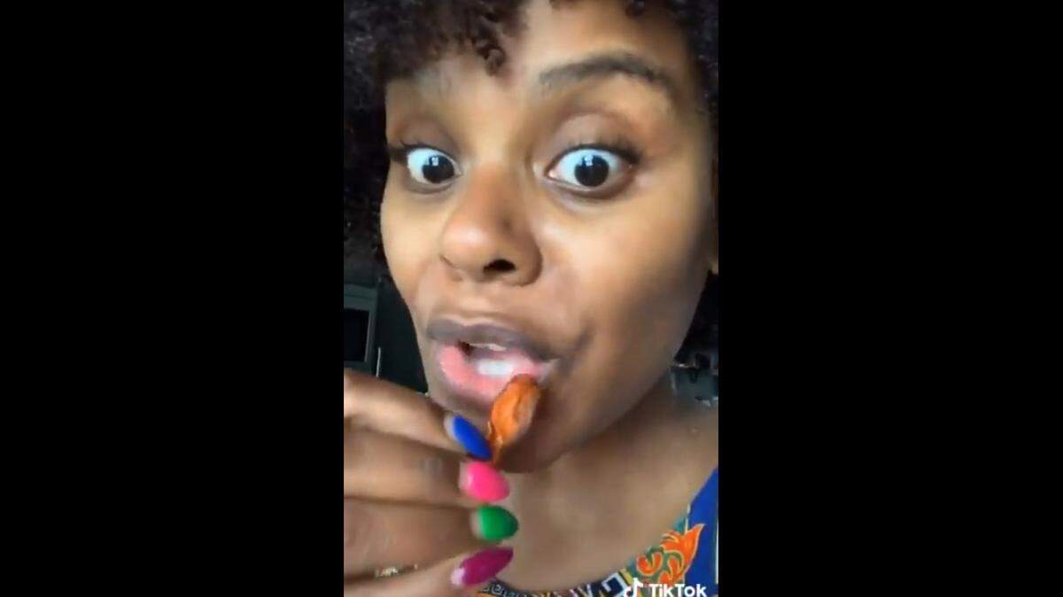 TikTok trailblazer Tabitha Brown, who is vegan, tries the “bacon” she made from carrots.