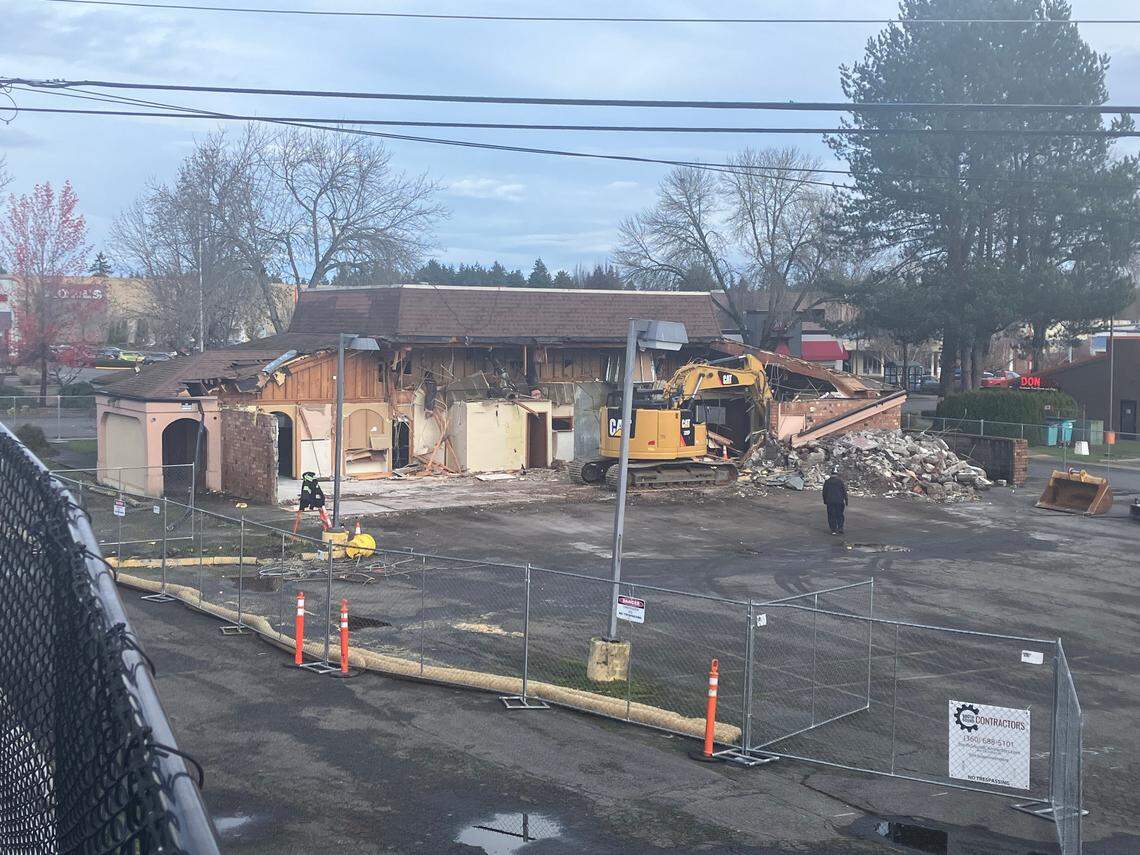 A longtime vacant building on Pacific Avenue in Lacey is being demolished.