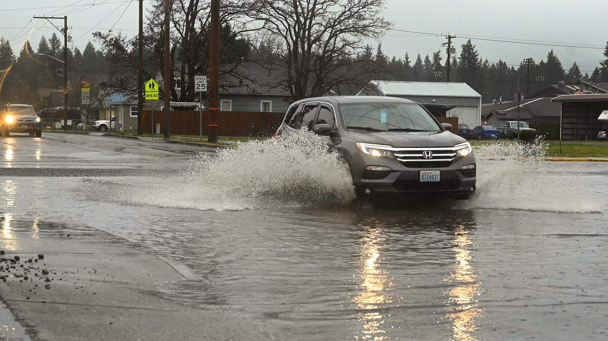 Heavy morning rains began to render Centre St. N. at the Binghampton St. intersection in Rainier nearly impassible for lower riding vehicles on Jan. 6, 2022.