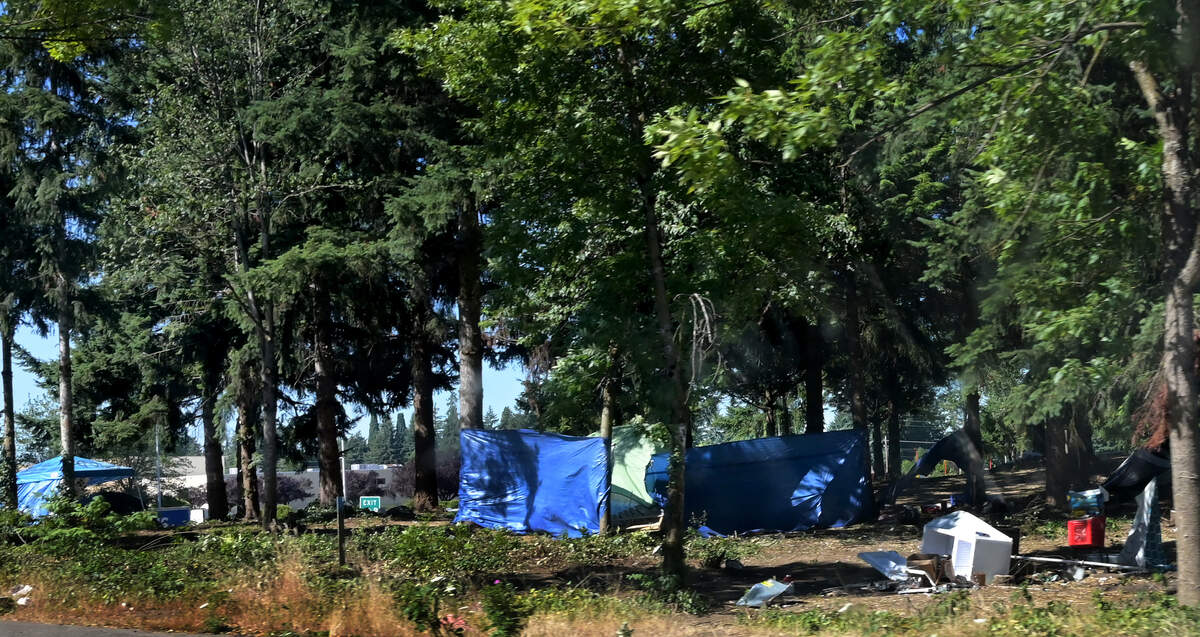 The homeless encampment community along Interstate 5 and near the Sleater Kinney Road NE overpass has dwindled in recent weeks as alternative housing options begin to become available. Photo July 18, 2023