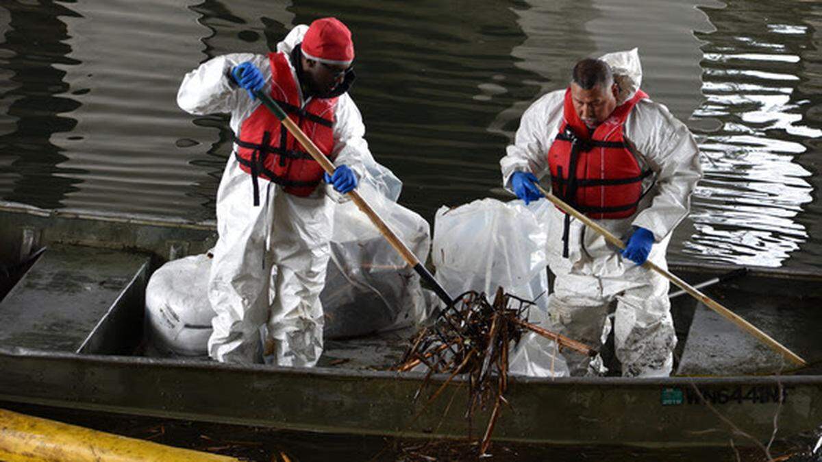 Work crews clean up after an oil spill that resulted from a vandalized transformer at the former Olympia Brewing Co. property in Tumwater in 2019.