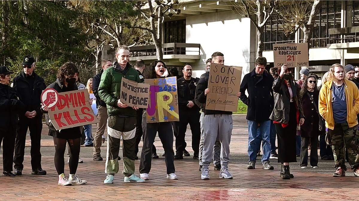 Several hundred people gathered at Red Square on The Evergreen State College campus on Dec. 13 to remember student Jonathan Rodriguez who died of suspected carbon monoxide poisoning in a room in the school’s modular housing complex.