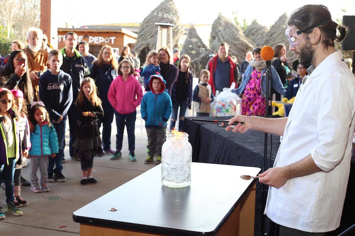 Dr. Science (also known as Ben Michaelis) sets ice on fire (thanks to a chemical reaction) at the Noon Year’s Eve event Dec. 31, 2017. He will do it again at Hands On Children’s Museum’s Ice Adventures this weekend.