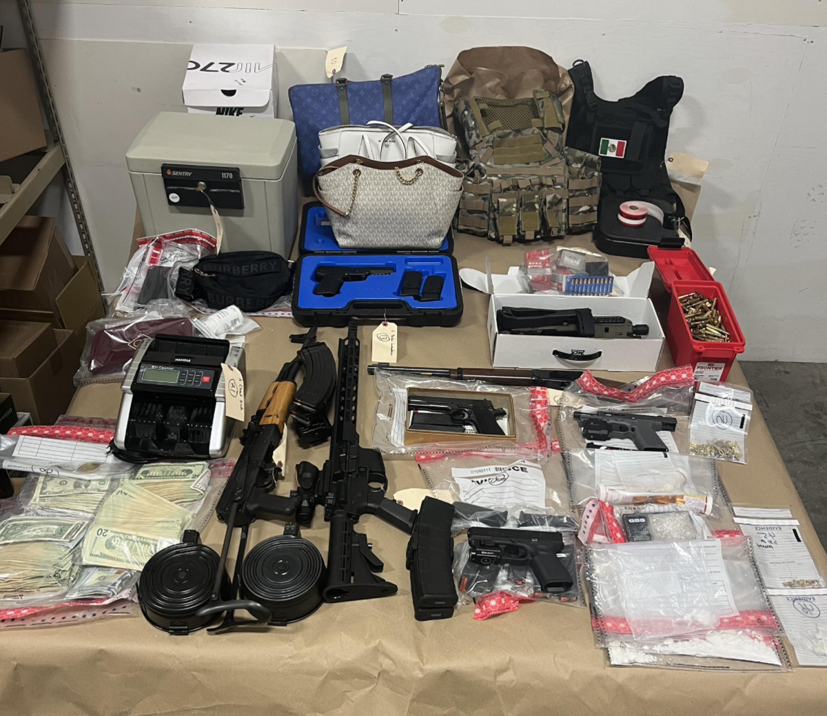 The Thurston County Narcotics Task Force seized a cocaine, pills, firearms, $14,000 in cash, drug paraphernalia and more after executing a search warrant in the Yelm area Tuesday, March 17, 2026.