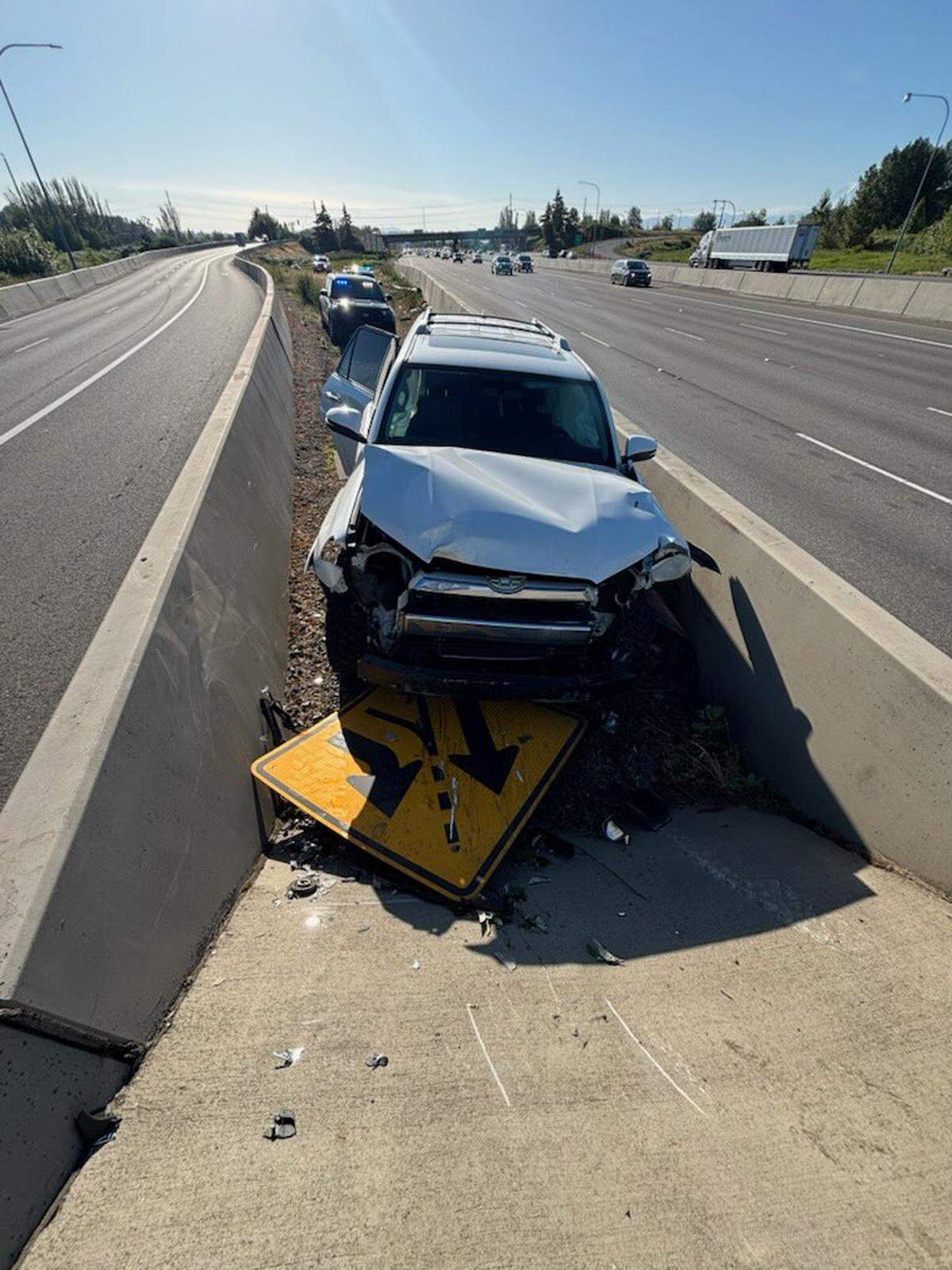 An SUV was ditched on southbound I-5 near Tacoma Sunday morning following a collision in the area.
