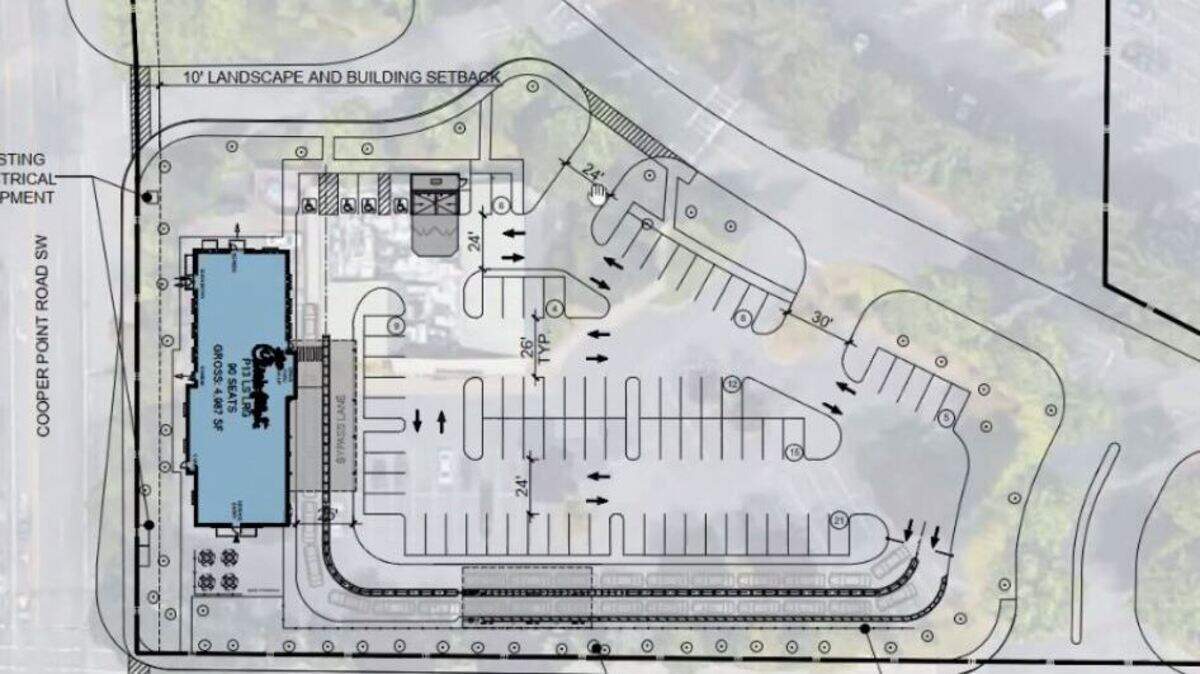 Chick-fil-A representatives showed this image to Olympia officials Wednesday morning. It shows the layout of the proposed buildling and parking lot at Cooper Point Road Southwest at Capital Mall Drive Southwest.