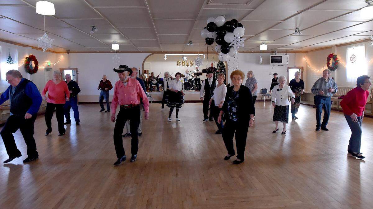 With music provided by the band Country Four & More dancers boot-scoot the New Year in during the Sunday afternoon dance at the Swede Hall Event Center in Rochester. With a fourth Sunday of western swing music soon to be added and hosted by the Rochester Citizens Group the dances are currently held the first, third and fifth Sundays of each month at the historic, 80-year-old community hall. Further information on the monthly dances along with other community events is available from their website at: http://.www.swedehall.com/.