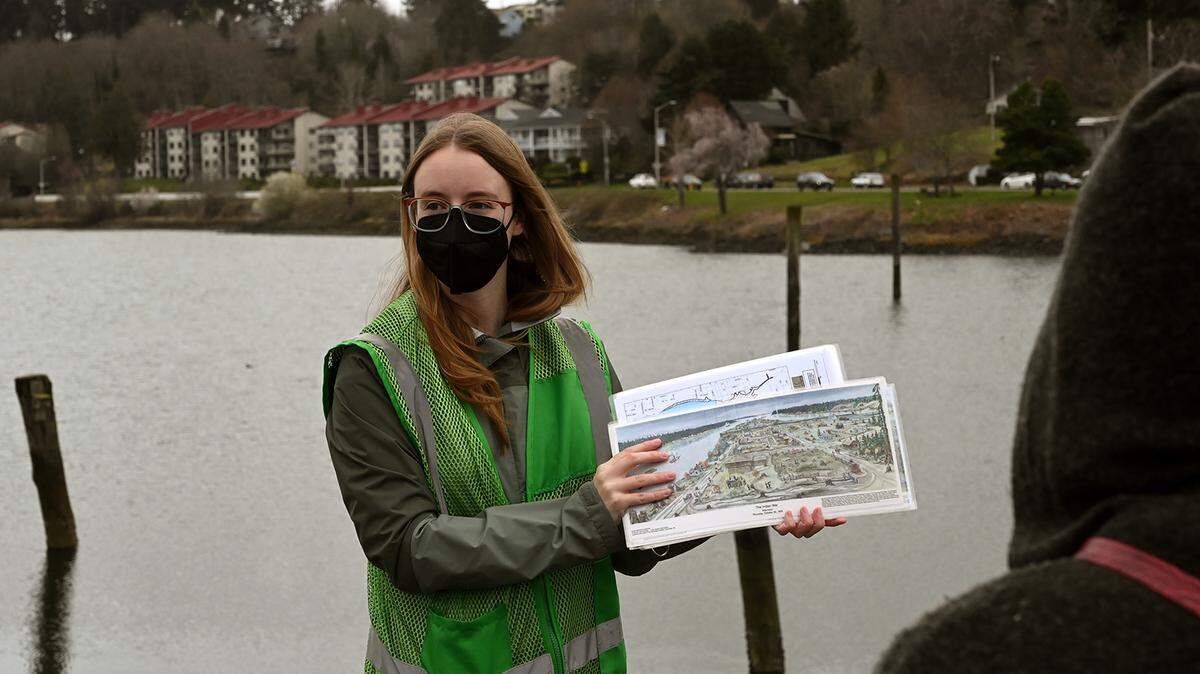 Clarissa Felling, program and volunteer coordinator for the Puget Sound Estuarium, stops at East Bay near Swantown Marina in Olympia on Saturday, March 13, 2022, as she leads the organization’s Sunday Sea Stroll shoreline tour.