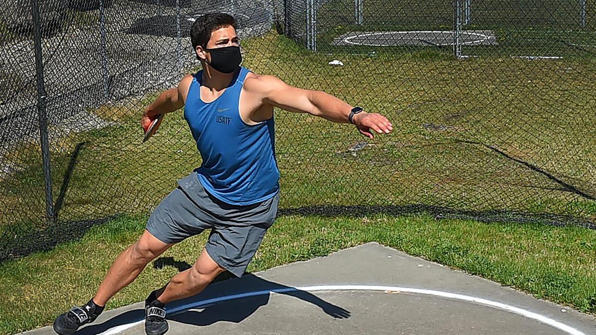 Going through his April 20, 2021 practice regimen Rainier High School junior Jeremiah Nubbe is the defending 2B state champion in the discus along with being the top-ranked thrower in the state in that event this season regardless of classification and third-ranked thrower nationally this spring