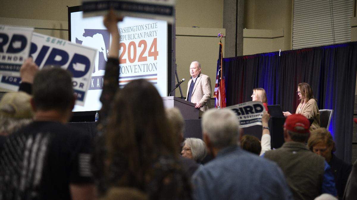 GOP Chairman Jim Walsh stands in front of delegates at the Washington State Republican Party convention in Spokane after announcing that the GOP would not be endorsing a gubernatorial candidate.