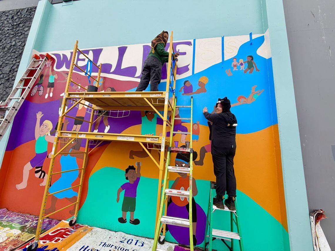 LoveOly microgrants helped fund this mural on the side of the Plum Street YMCA in downtown Olympia.