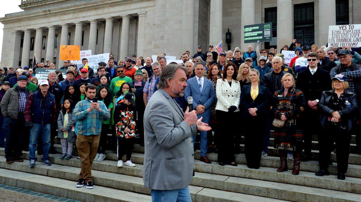 Let’s Go Washington initiative organizer Brian Heywood speaks to several hundred supporters gathered for a rally at the state Capitol in Olympia on Feb, 23. Heywood encouraged state voters to support the initiatives that will be on the ballot in November. A money manager from Seattle, Heywood financed the signature campaigns for all of the initiatives.