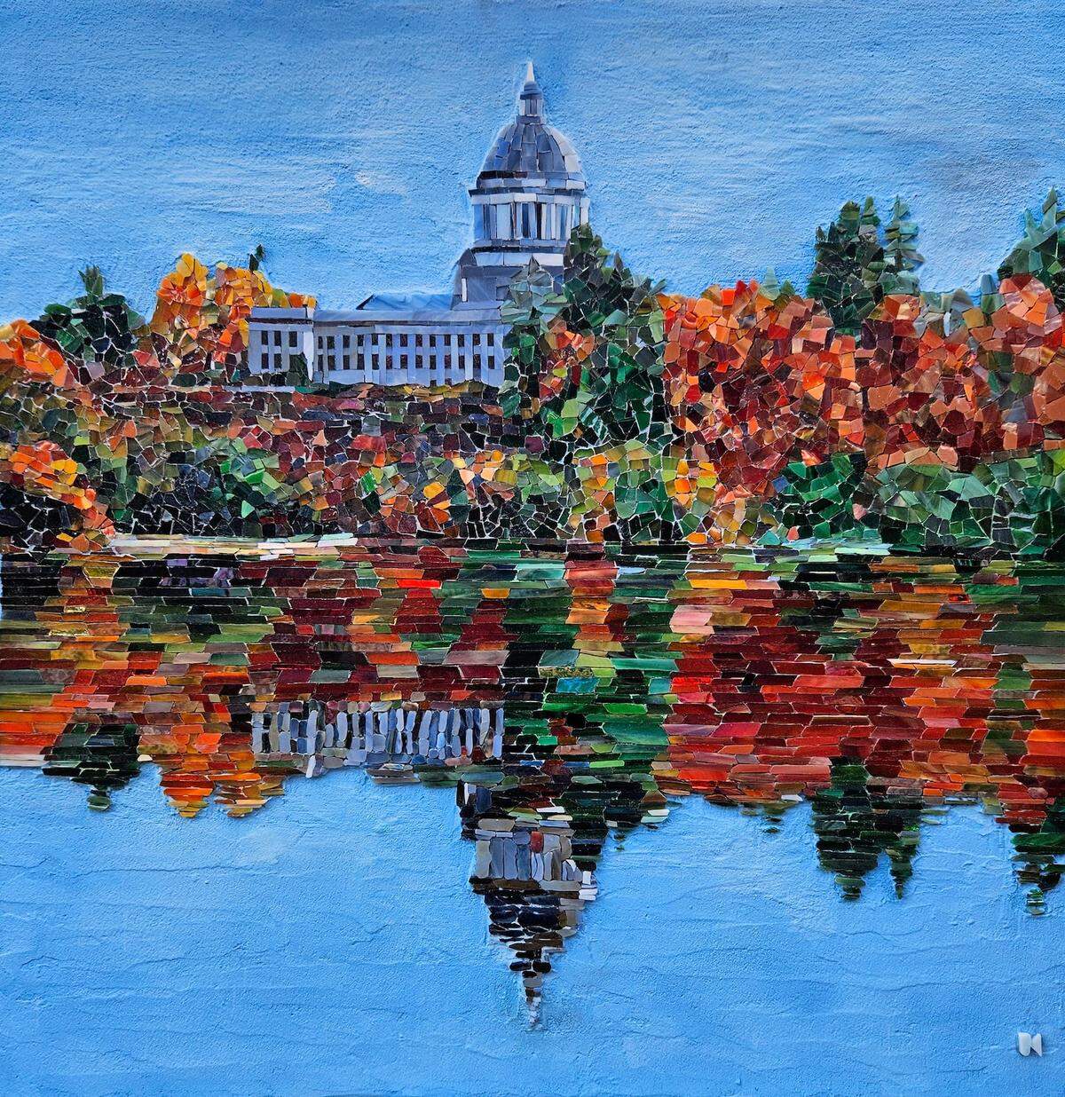 Jennifer Kuhns’ detailed glass mosaic “Olympia Reflections,” based on a photo she took on a lovely fall day, is on the cover of the Fall Arts Walk map. Arts Walk happens this Friday and Saturday, Oct. 6 and 7.