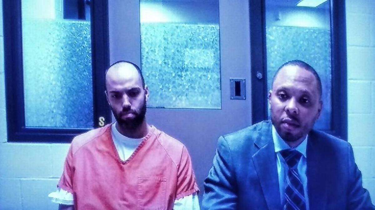Christopher M. Heeren, 34, (left) was found guilty on all counts, including first-degree murder, in Thurston County Superior Court, a deputy prosecutor said Wednesday. Here he is shown during a preliminary appearance in fall 2017.