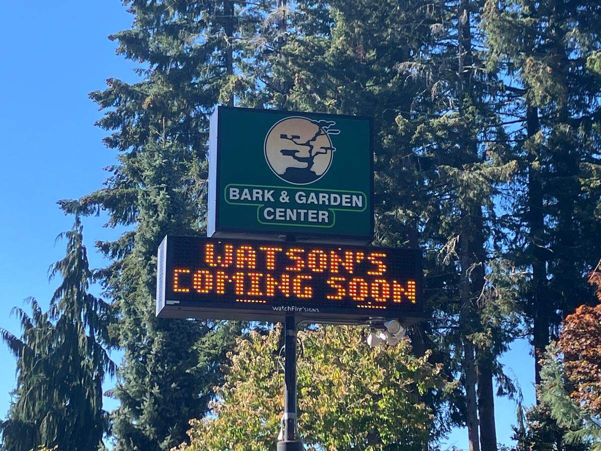 The Bark & Garden Center sign on Harrison Avenue in west Olympia announcing that Watson’s is “coming soon.”