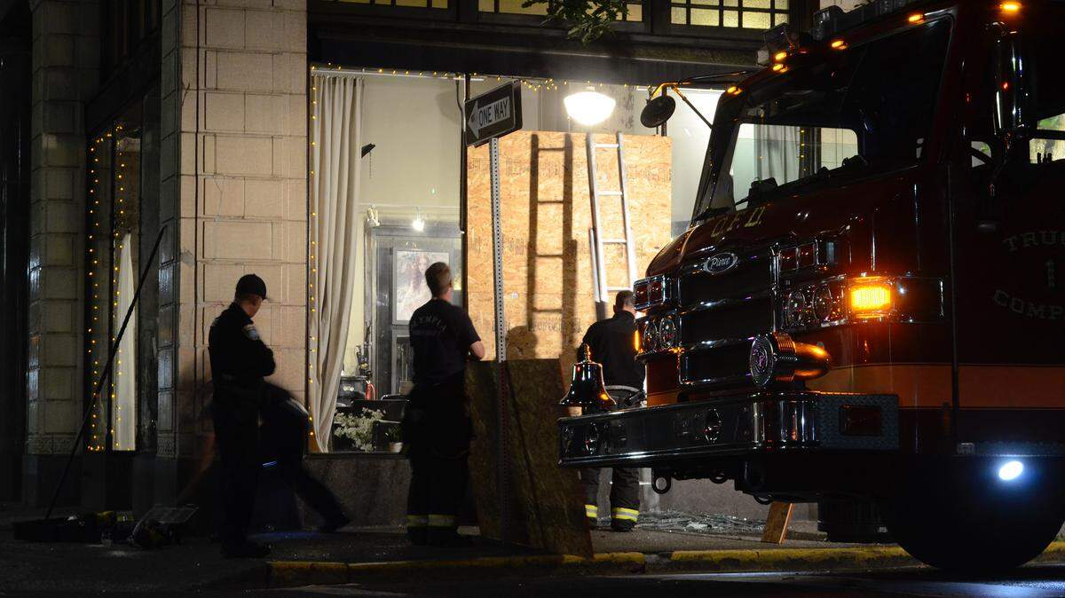 An Olympia fire crew responded to board up a window after a downtown business was vandalized about 3 a.m. Wednesday.