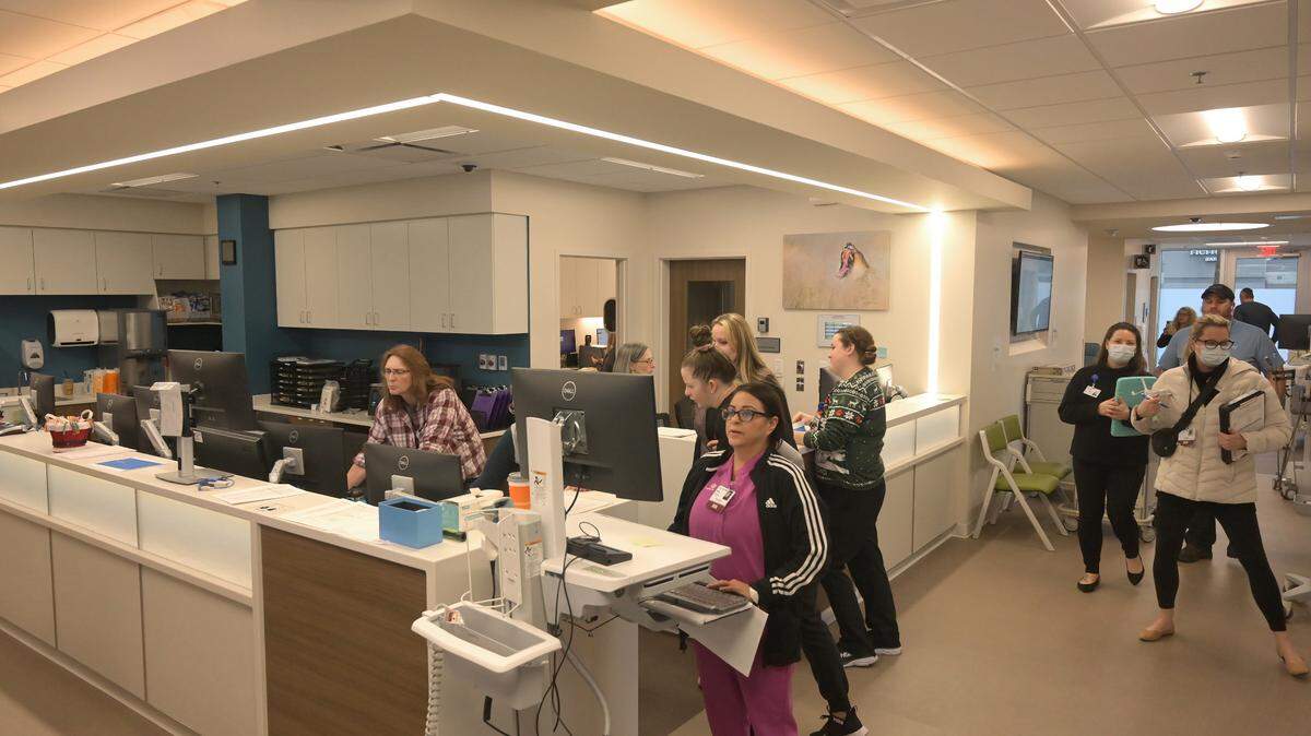 The main nurses station at the new Multicare Lacey Emergency bustles with activity as staff continue set-up and training procedures on Dec. 12, 2023.