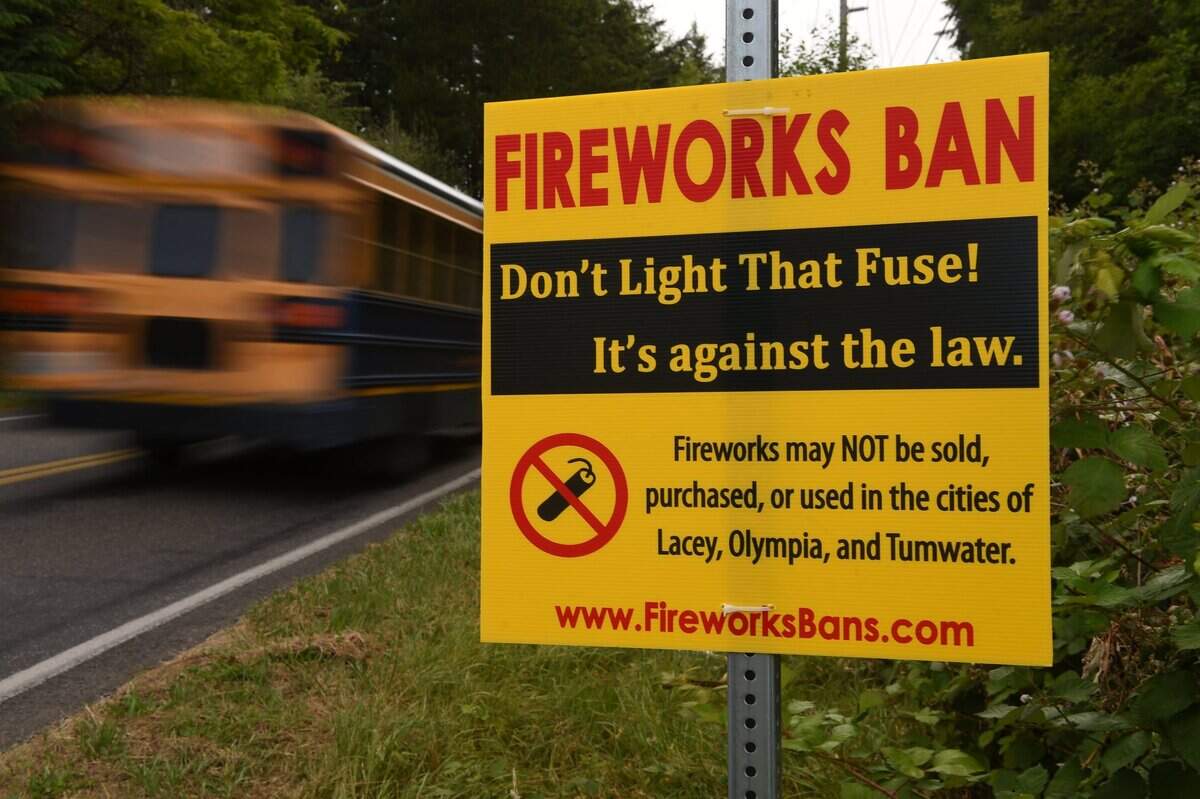 A sign announces fireworks bans in Lacey, Olympia and Tumwater ahead of the Fourth of July.