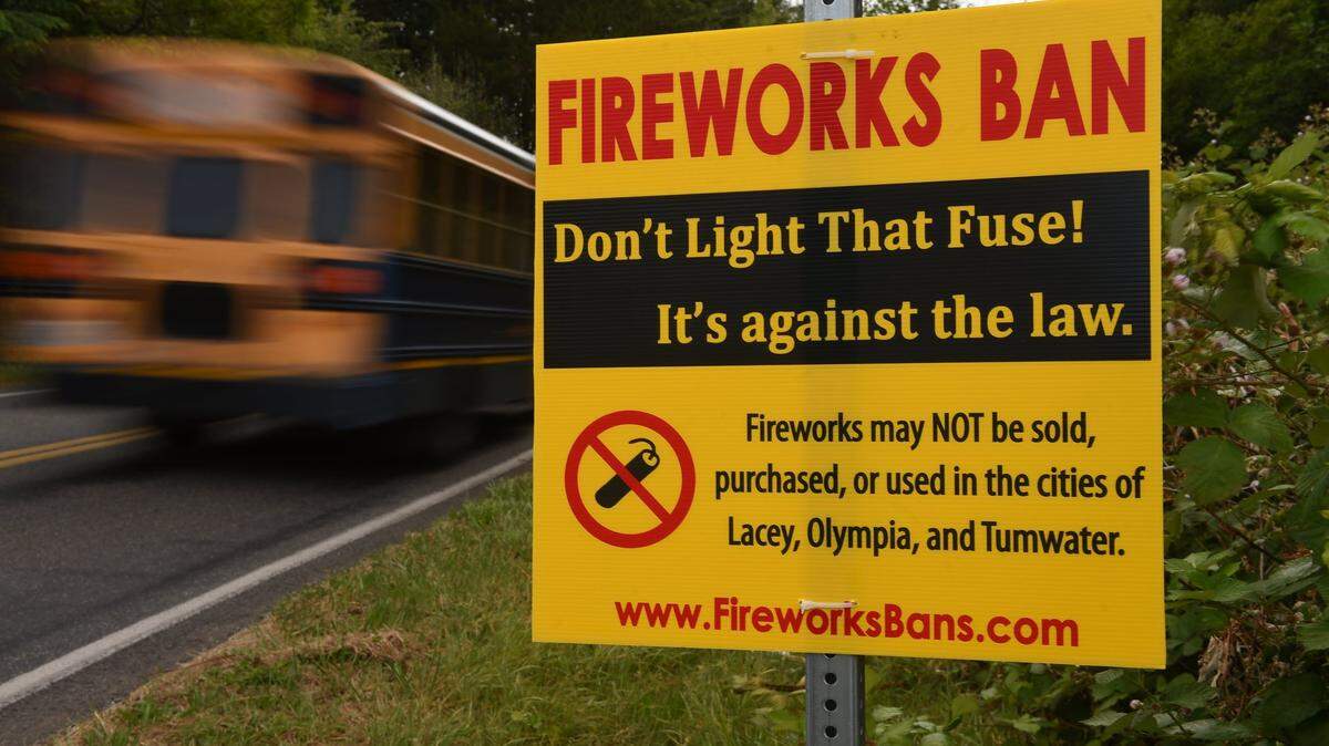 A sign announces fireworks bans in Lacey, Olympia and Tumwater ahead of this year’s Fourth of July. This was the first year fireworks were banned in Tumwater.