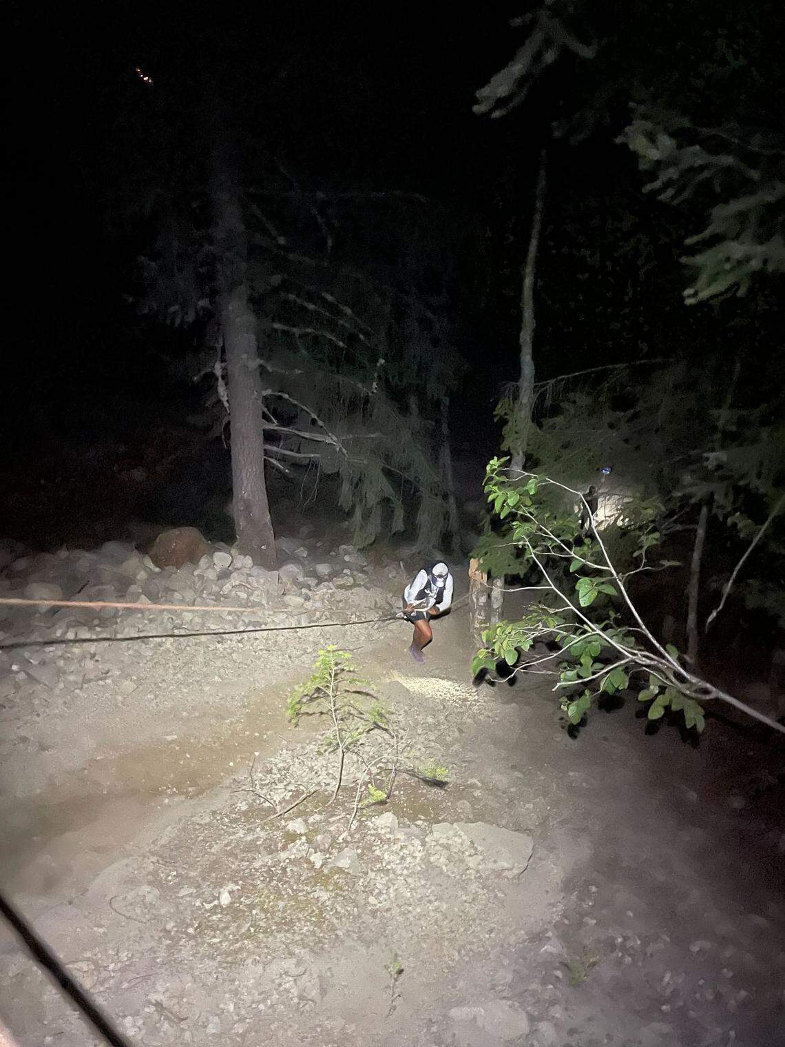 A part of the Cascade Crest 100 course features ropes that runners need to navigate to climb or descend from peaks.