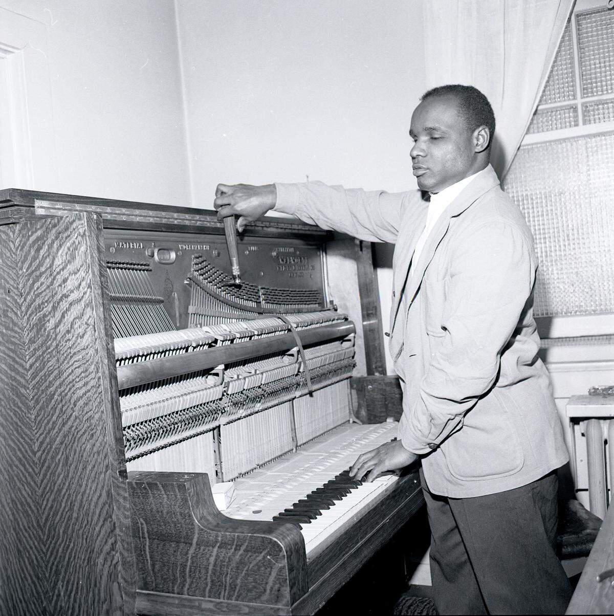 John Grace arrived in Olympia in the early 1960s and maintained a piano shop and piano tuning business on Capitol Way.
