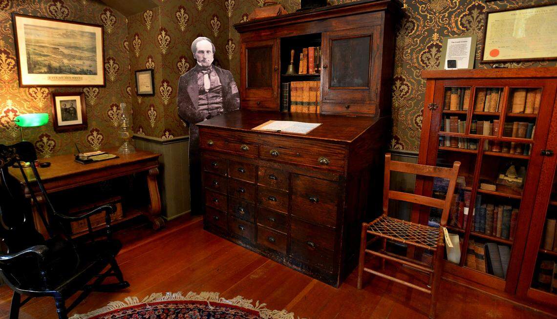 A cut-out figure of family patriarch Daniel Bigelow greets visitors in the office of the historic Bigelow House Museum. The landmark Olympia residence, which served as home to four generations of the Bigelow family, is located at 918 Glass Ave. NE.