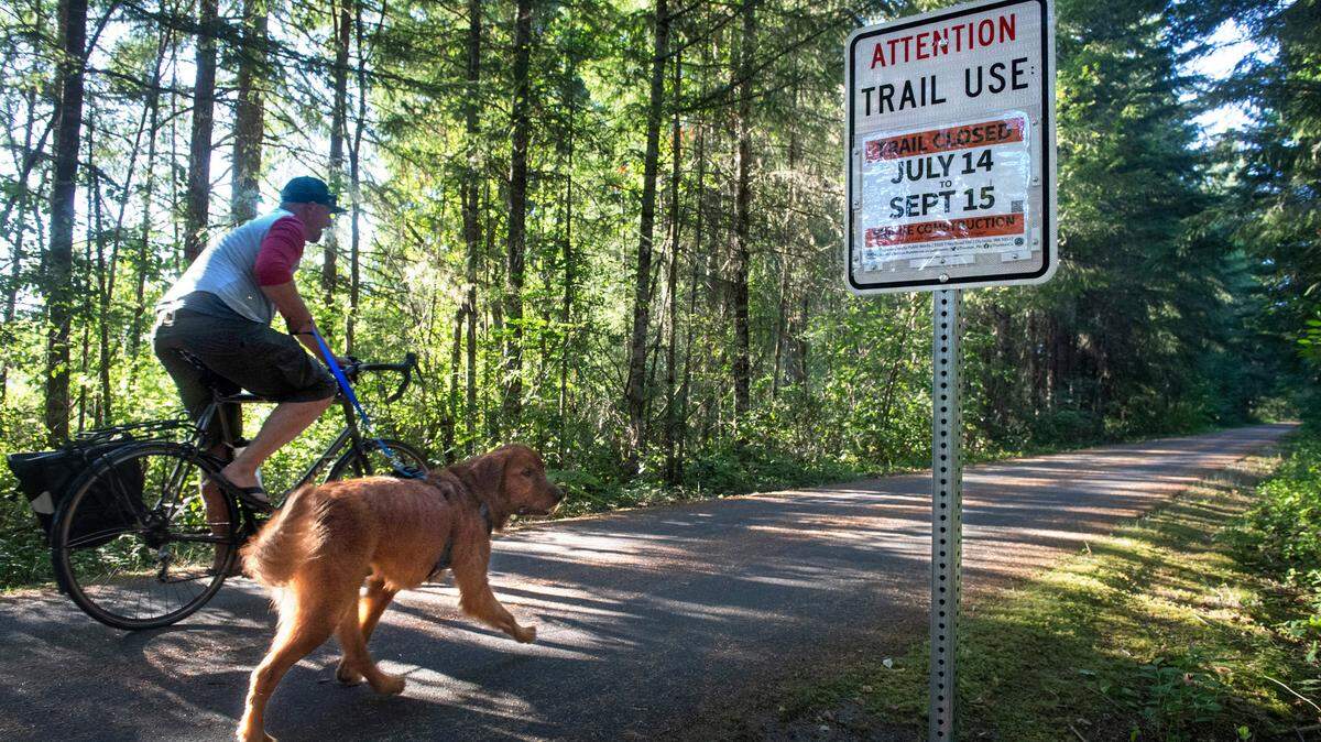 Despite a sign saying a portion of the Chehalis-Western Trail would close on Wednesday, users could still move through the section from 89th Avenue to 113th Avenue south of Tumwater. A walking bridge and overlook will be built to replace culverts that carry Spurgeon Creek underneath the former rail line.