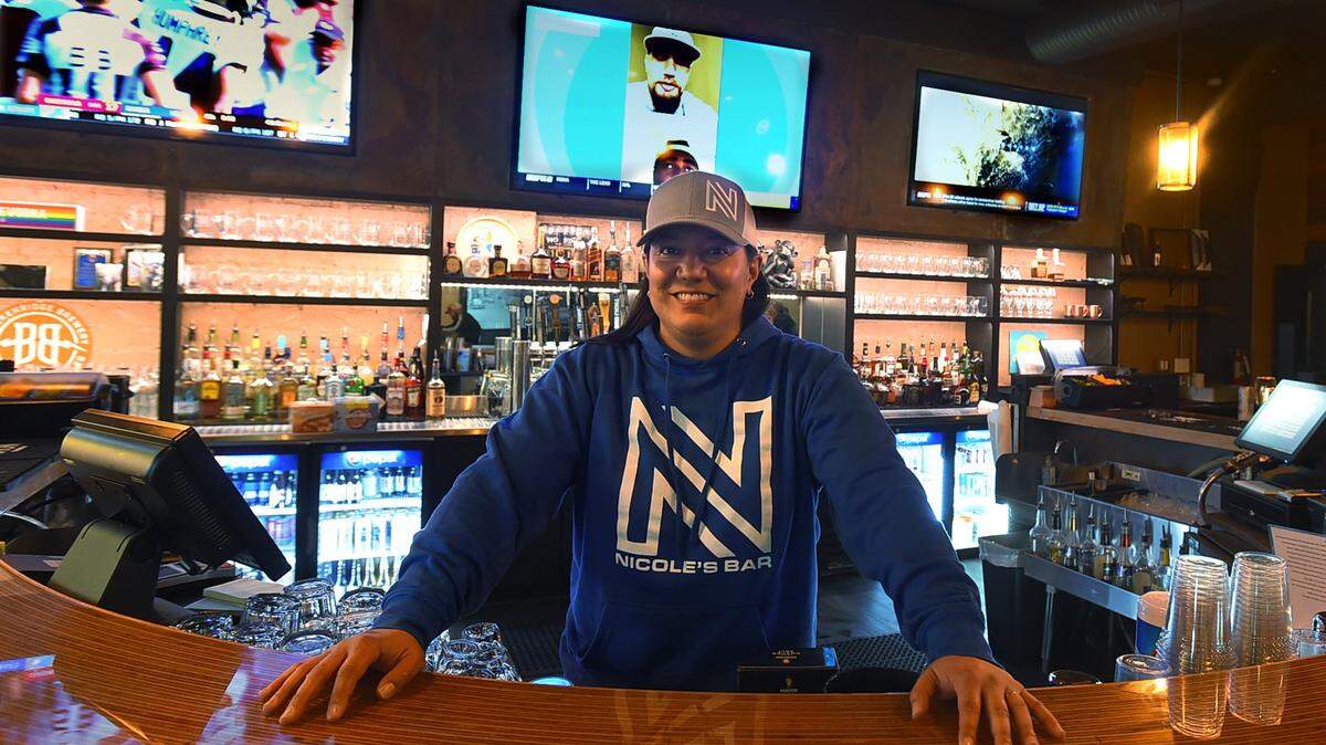 Longtime bartender Nicole Andres at her downtown Olympia establishment, Nicole’s Bar.