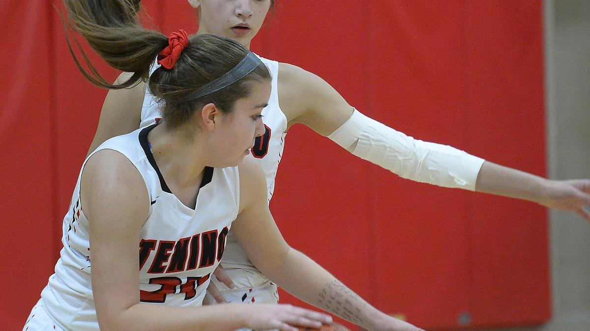 Kaylee and (24) and Ashley Schow warm-up before their game with visiting Montesano on Jan. 22nd.