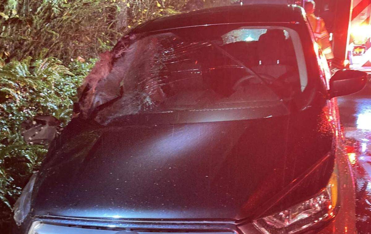 A photo taken at the scene shows a damaged state Department of Corrections vehicle.